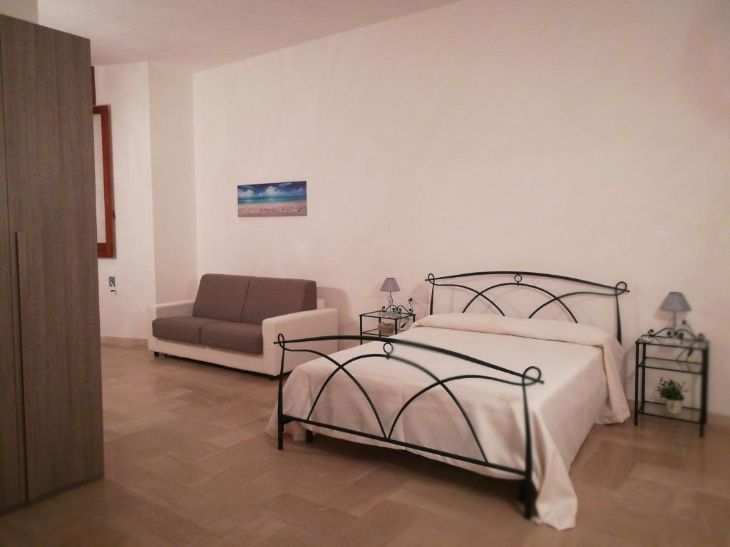 Postel nebo postele na pokoji v ubytování Le Strazzigne