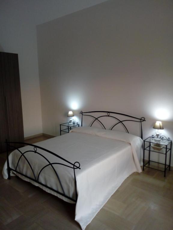 Postel nebo postele na pokoji v ubytování Le Strazzigne