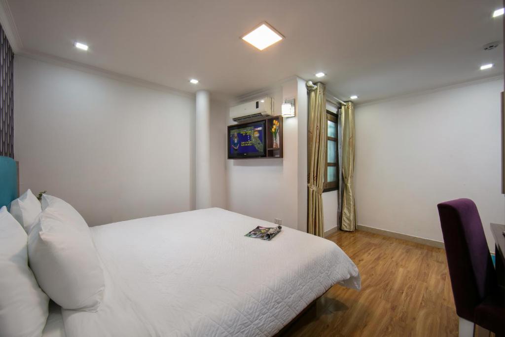 Postel nebo postele na pokoji v ubytování golden time hostel