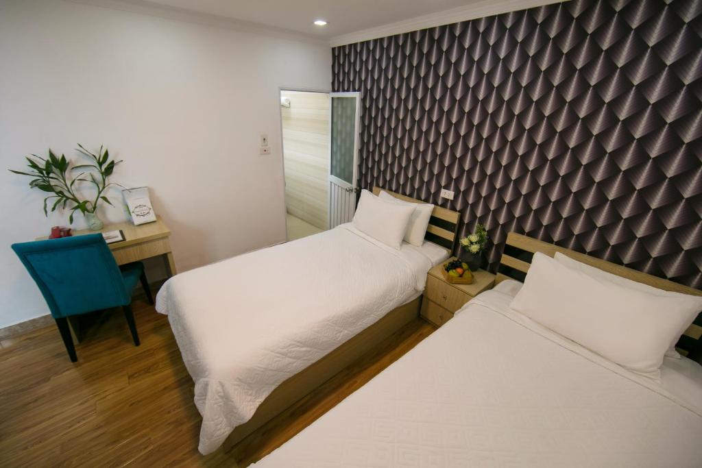 Postel nebo postele na pokoji v ubytování golden time hostel