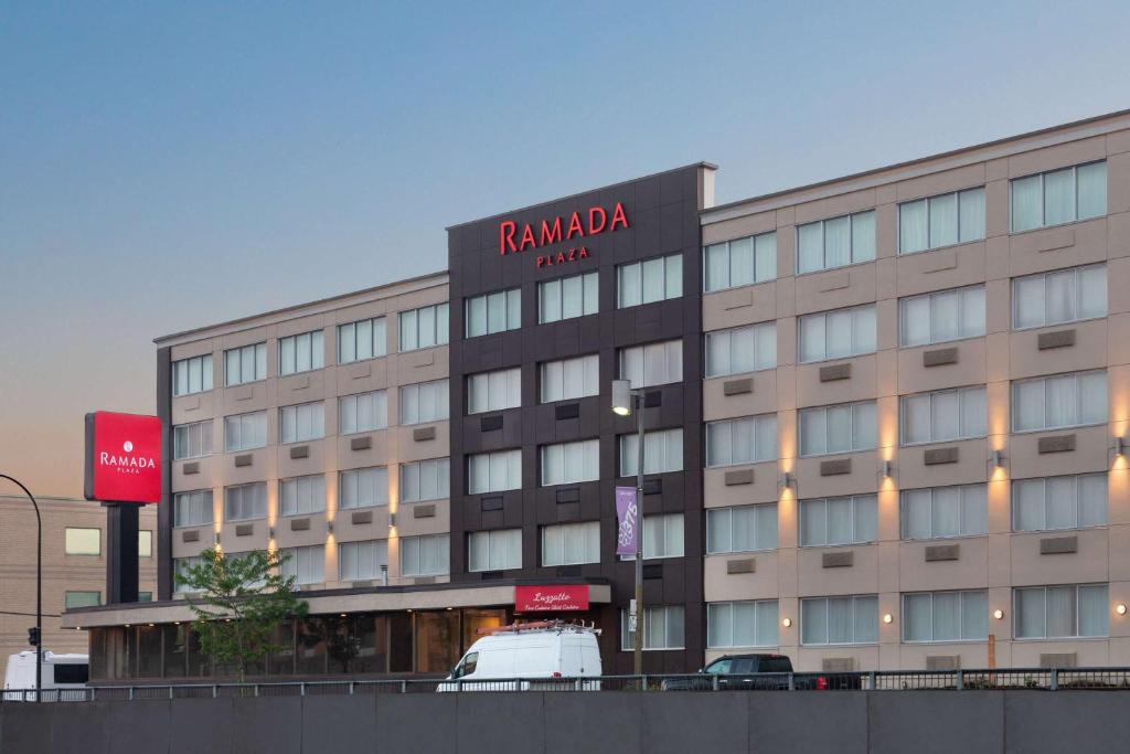 a building with a sign that reads rambala hotel at Ramada Plaza by Wyndham Montreal in Montreal