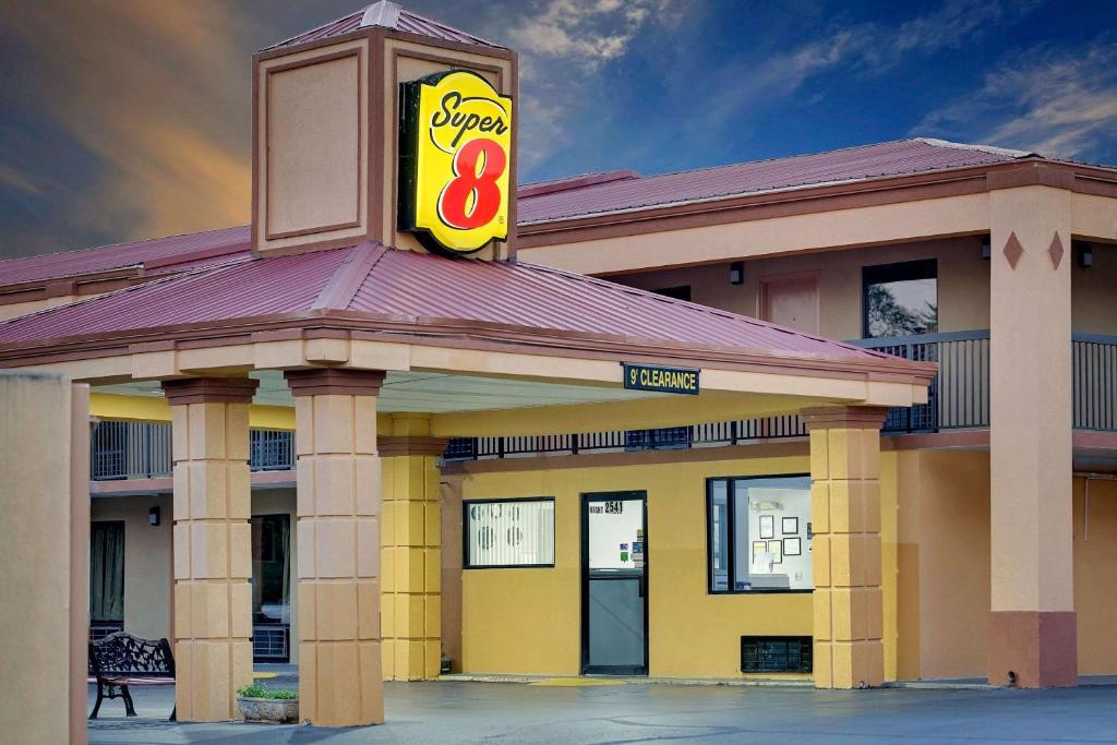 a fast food restaurant with a sign on top of it at Super 8 by Wyndham Athens in Athens