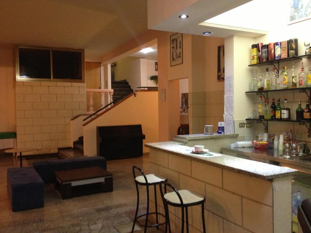 Kuchyň nebo kuchyňský kout v ubytování Hotel Esperia