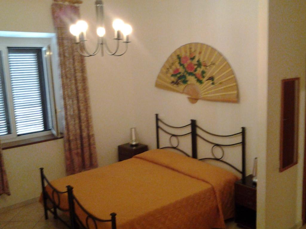 Postel nebo postele na pokoji v ubytování Hotel Touring