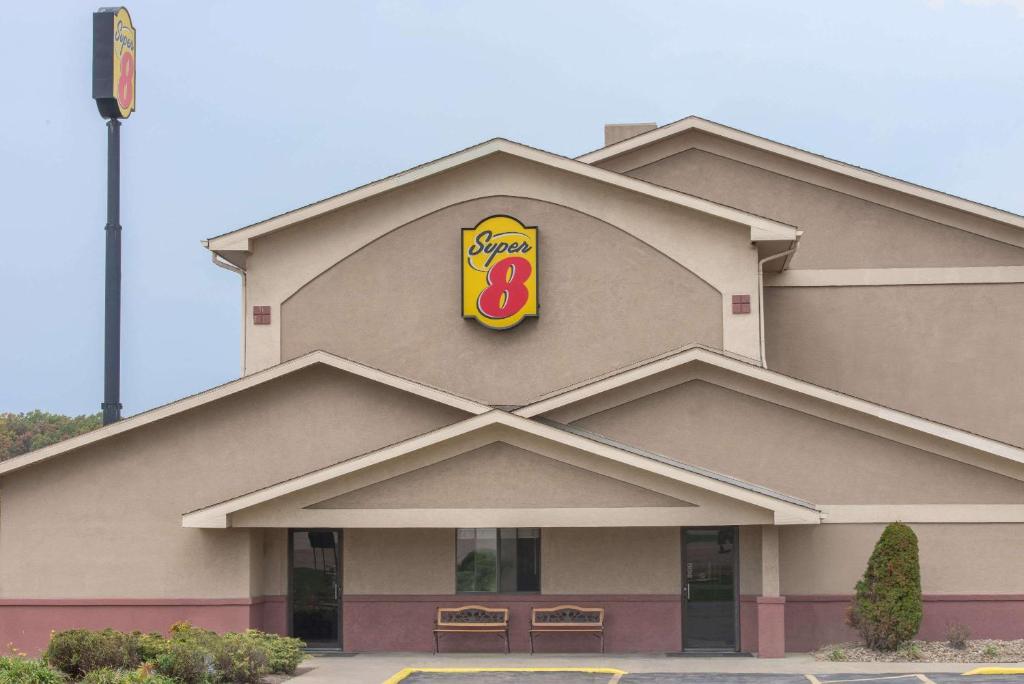 a fast food building with a mcdonalds sign on it at Super 8 by Wyndham Youngstown/Austintown in Youngstown