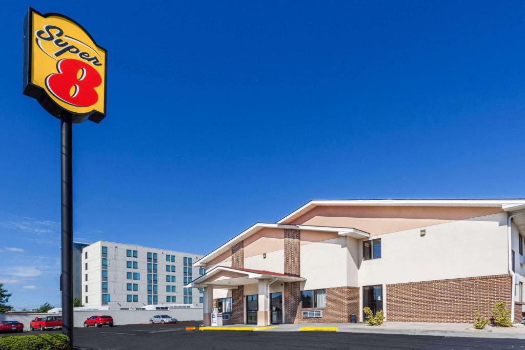 a sign in front of a hotel at Super 8 by Wyndham Winchester VA in Winchester