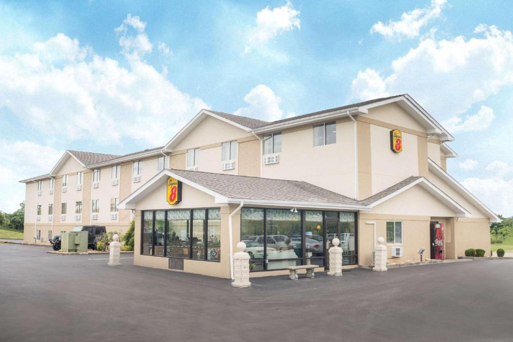 a rendering of a hotel with a building at Super 8 by Wyndham Corbin KY in Corbin