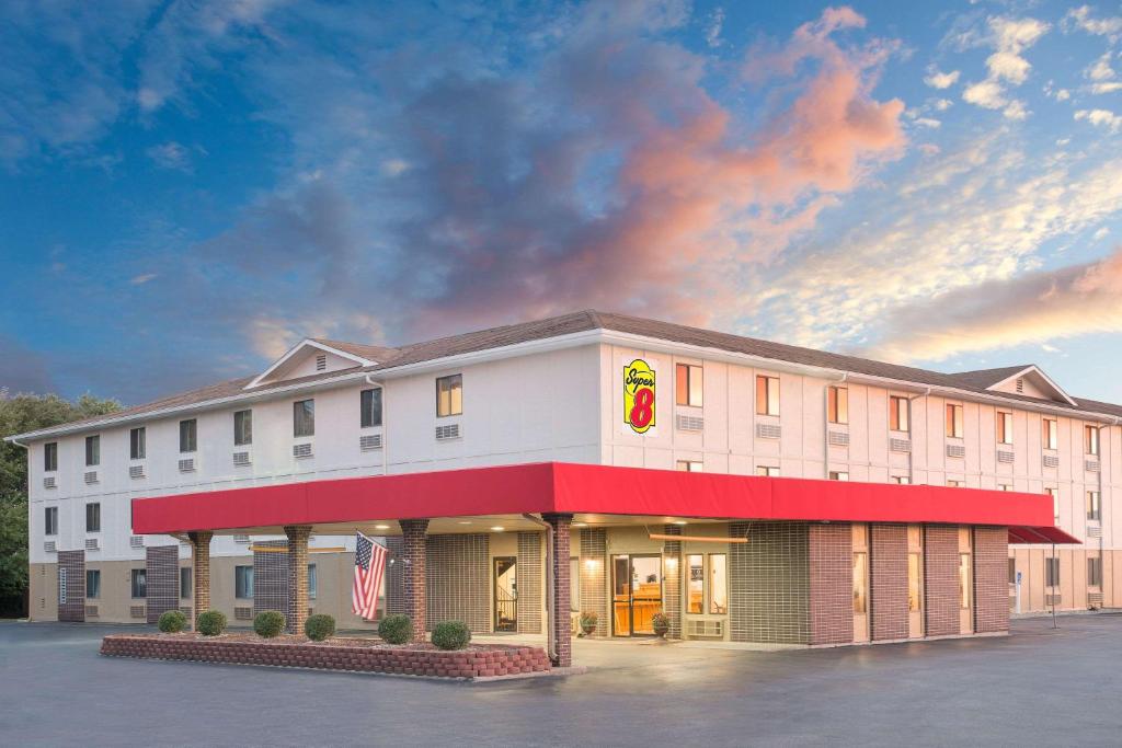 a rendering of the front of a hotel at Super 8 by Wyndham Terre Haute in Terre Haute