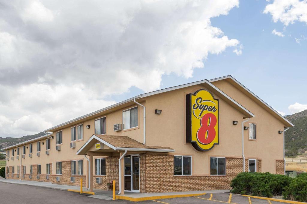 a building with a burger eight sign on it at Super 8 by Wyndham Nephi in Nephi