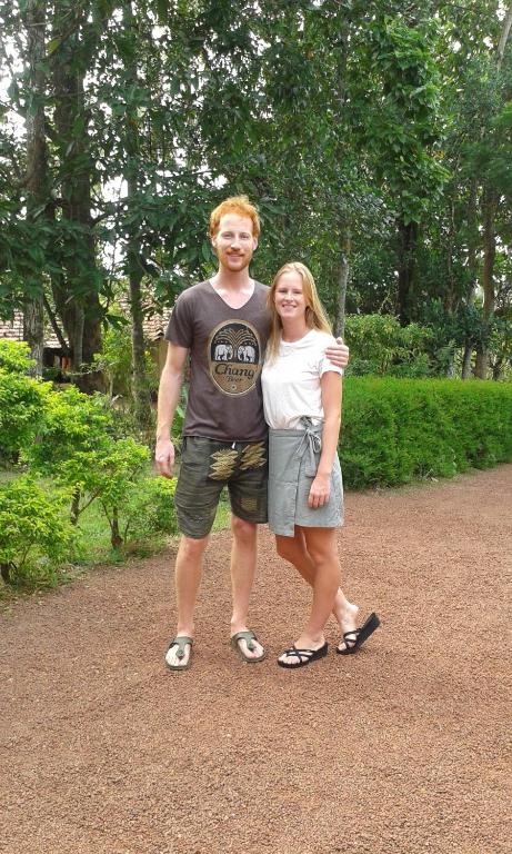 a man and a woman posing for a picture at Sunset Villa in Negombo