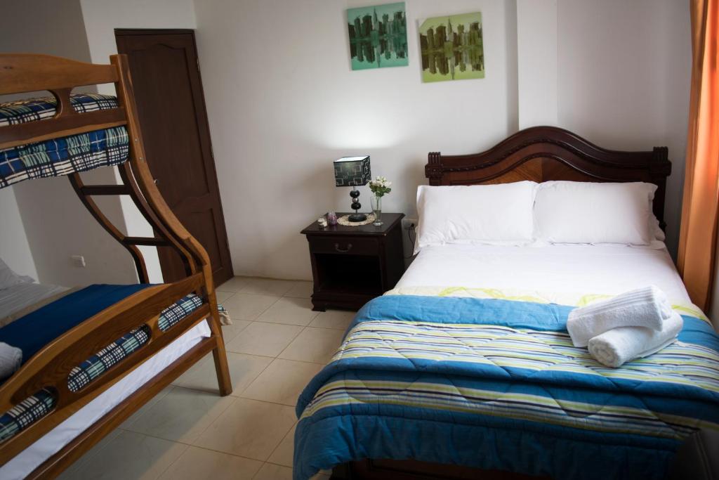 Postel nebo postele na pokoji v ubytování Hotel Valeritos
