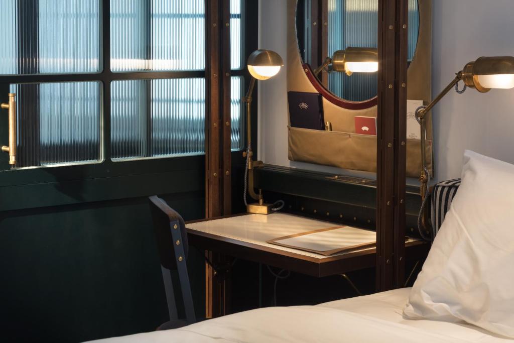 Letto o letti in una camera di The Fleming Hong Kong