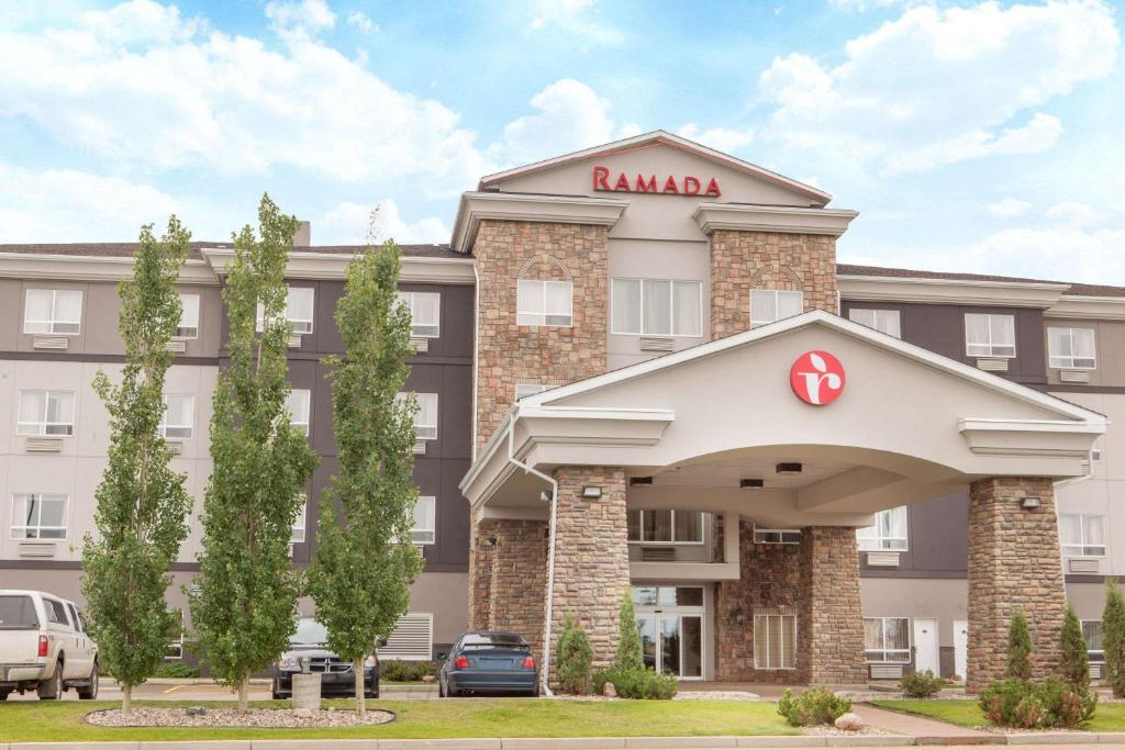 a rendering of the front of a hotel at Ramada by Wyndham Camrose in Camrose
