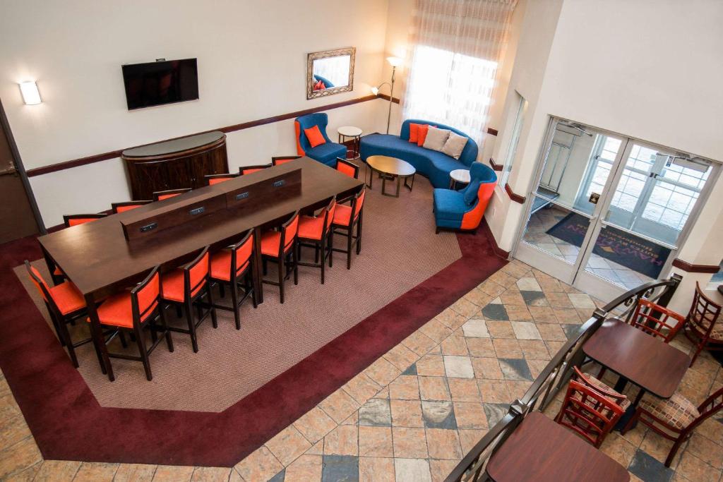 an overhead view of a living room with a table and chairs at Hawthorn Suites Las Vegas in Las Vegas