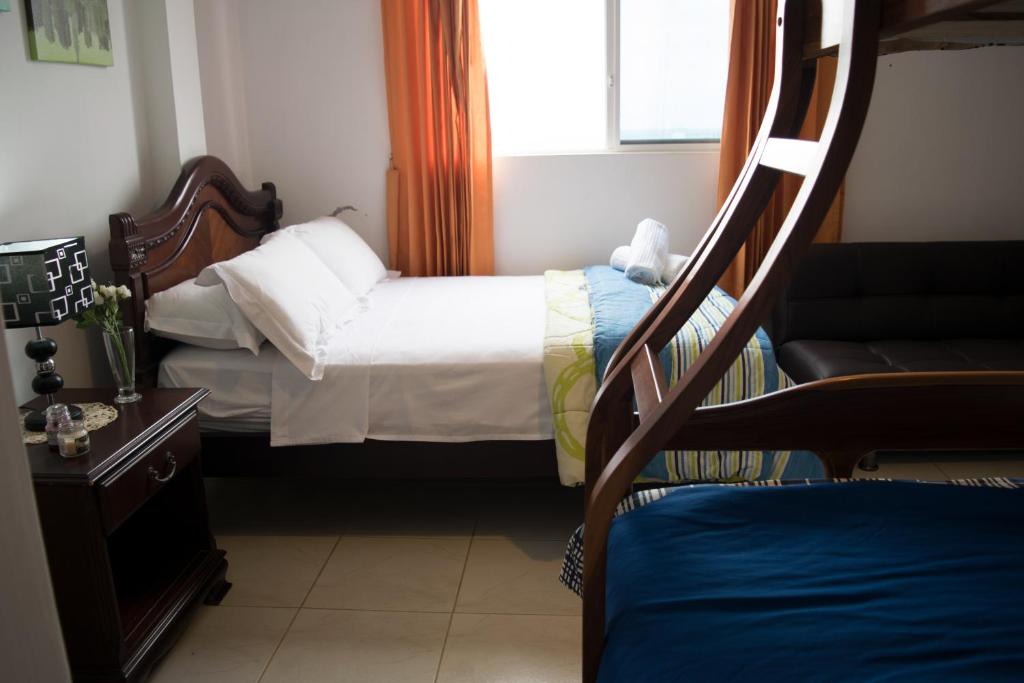 Postel nebo postele na pokoji v ubytování Hotel Valeritos