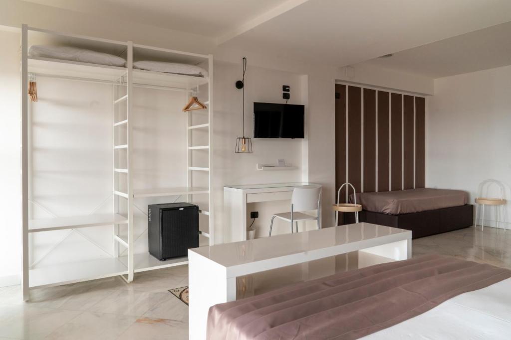 Postel nebo postele na pokoji v ubytování Hotel Continental