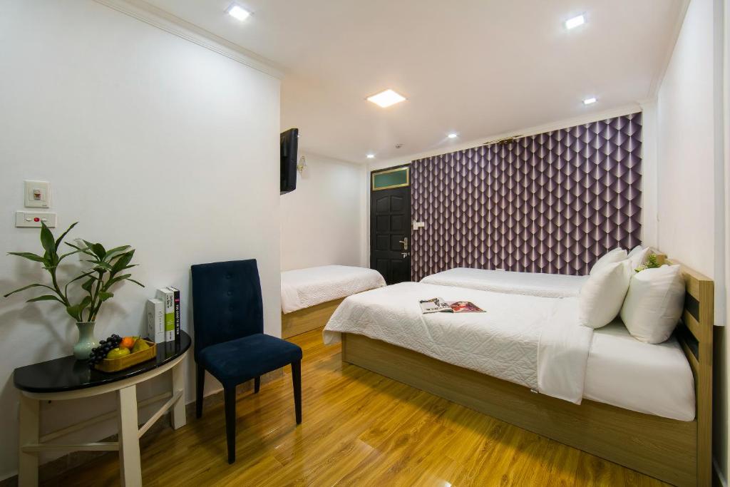 Postel nebo postele na pokoji v ubytování golden time hostel