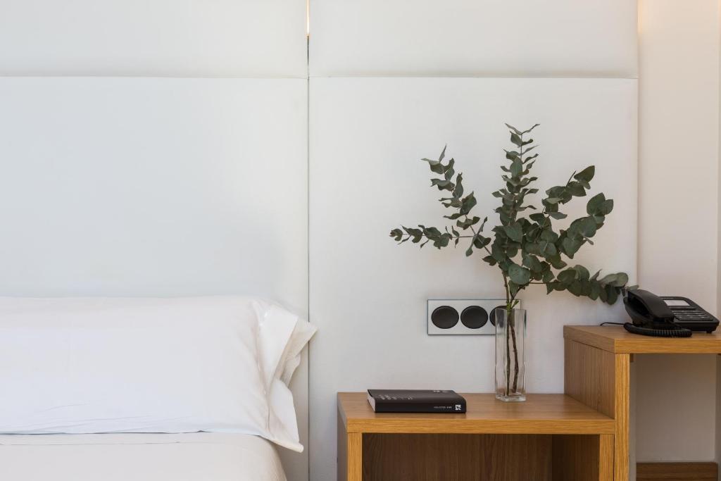 Postel nebo postele na pokoji v ubytování Hotel Palacio de Aiete