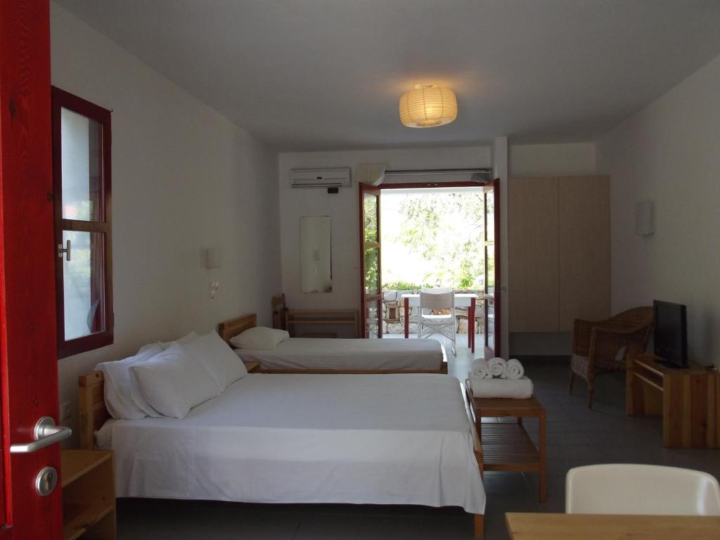 Posteľ alebo postele v izbe v ubytovaní Kyfanta, studios & apartments in Kyparissi