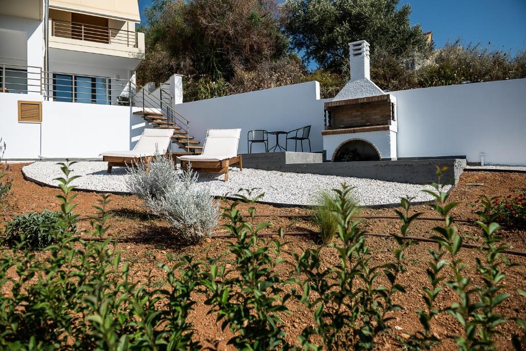Vonkajšia záhrada v ubytovaní Blue Island Luxury Apartment