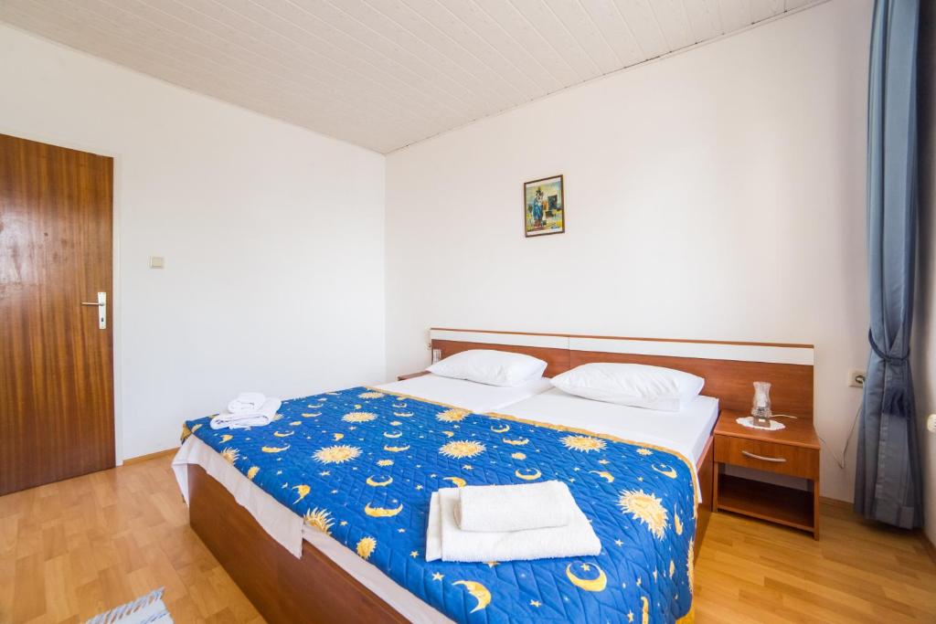 Postel nebo postele na pokoji v ubytování Villa Gomila