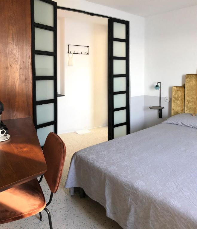Postel nebo postele na pokoji v ubytování Agave Room Rental