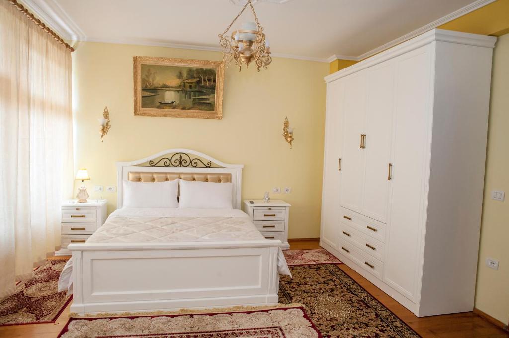 Postel nebo postele na pokoji v ubytování Villa Parku Rinia