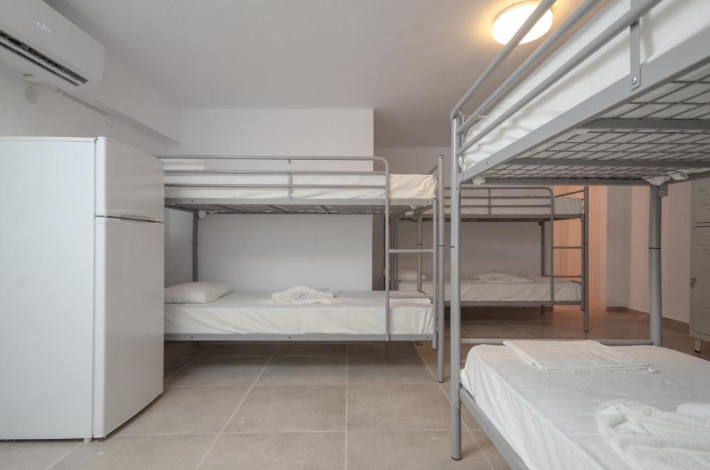 Postel nebo postele na pokoji v ubytování Naxos Hostel