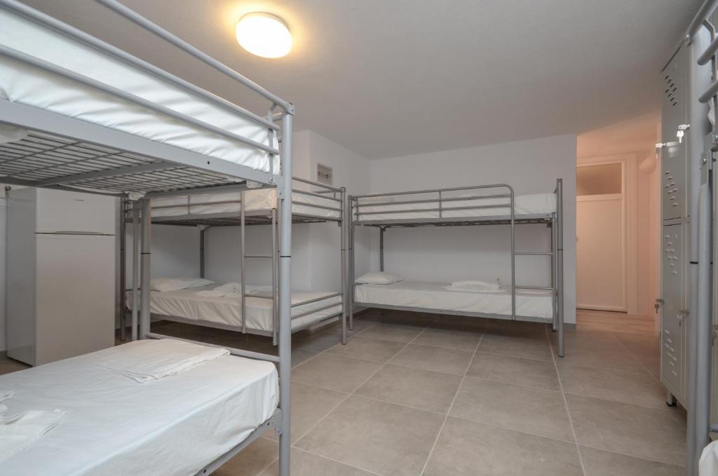 Postel nebo postele na pokoji v ubytování Naxos Hostel