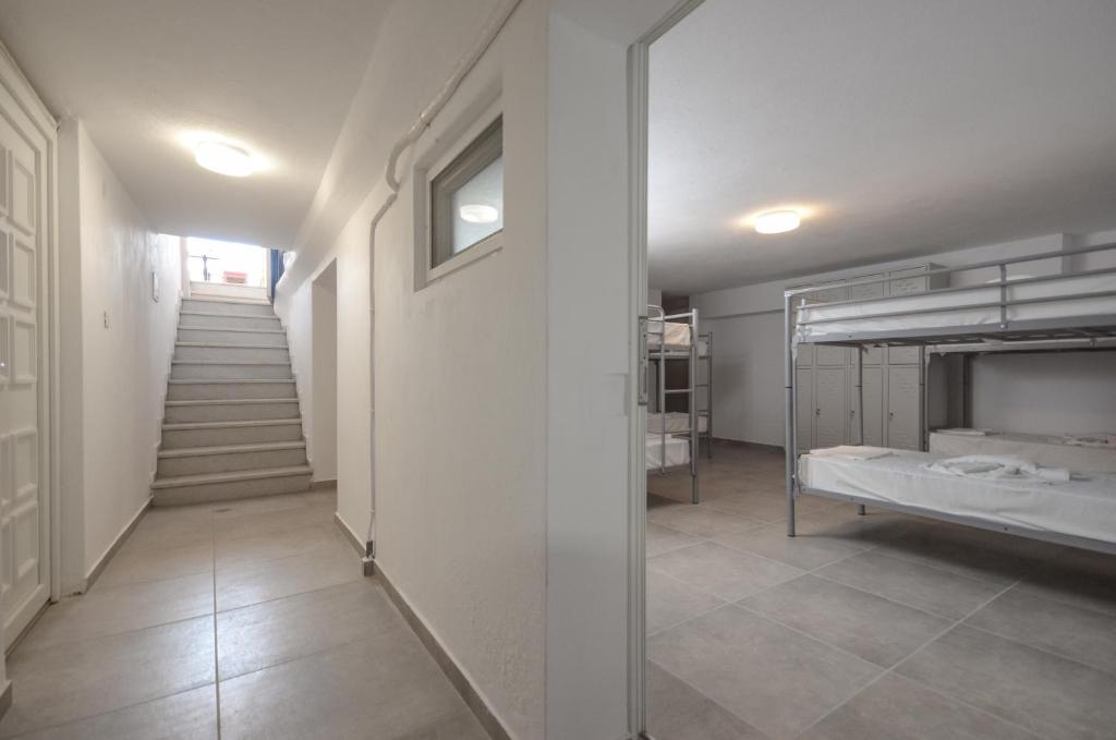 Postel nebo postele na pokoji v ubytování Naxos Hostel