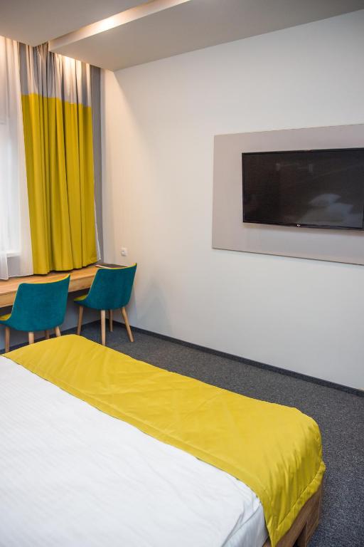 TV a/nebo společenská místnost v ubytování Hotel Bistrita