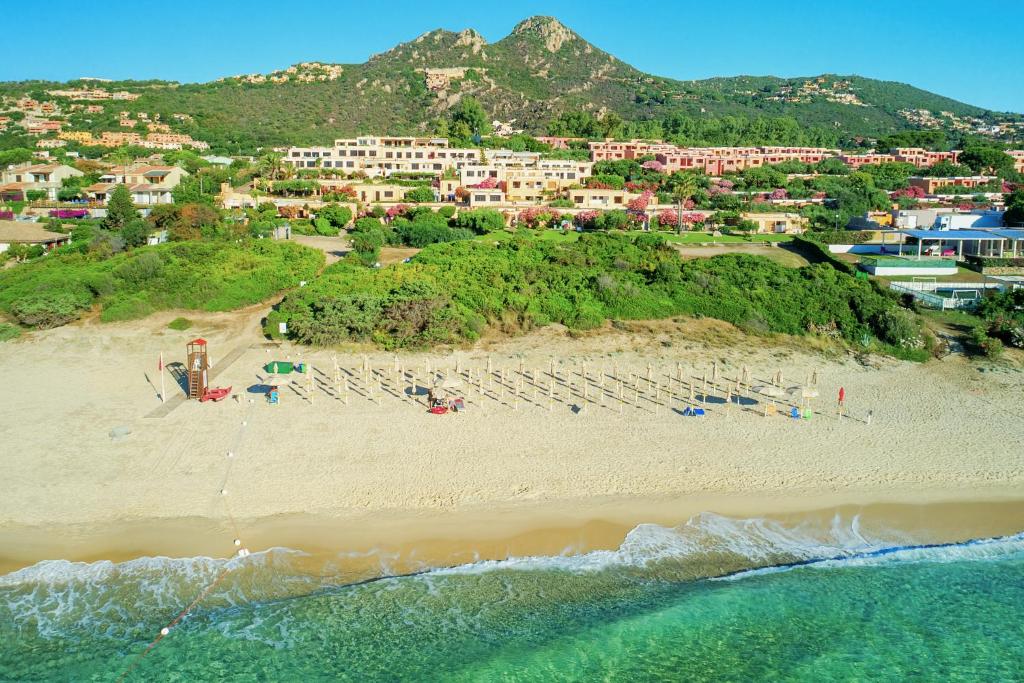 an aerial view of a beach with a group of people at "SARDESIDENCE" Spiaggia Privata WiFi Parcheggio Riservato in Costa Rei