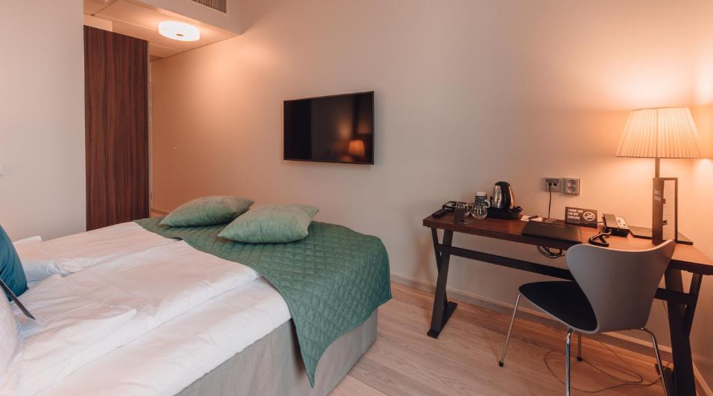 Postel nebo postele na pokoji v ubytování Clarion Hotel Helsinki