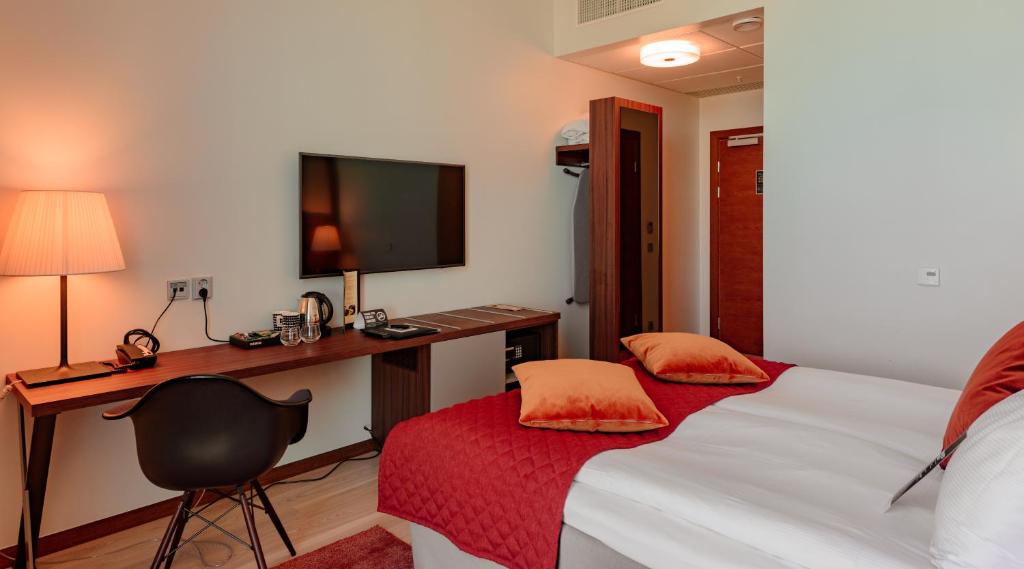 Postel nebo postele na pokoji v ubytování Clarion Hotel Helsinki