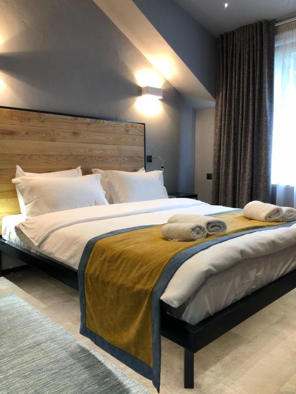 Postel nebo postele na pokoji v ubytování Plai Hotel
