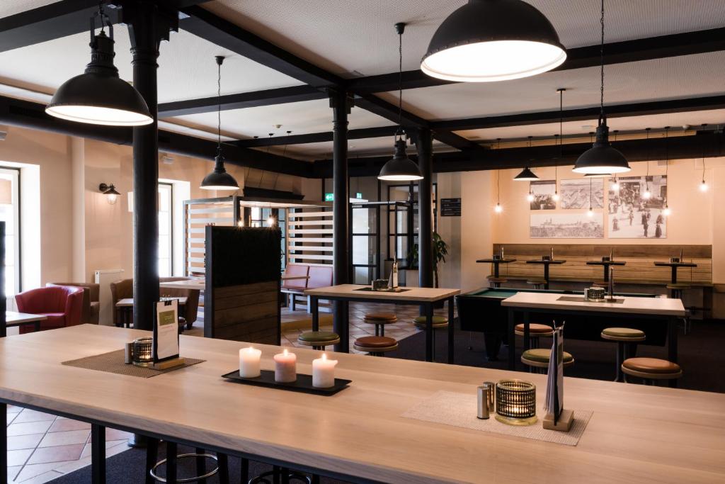 Kuchyň nebo kuchyňský kout v ubytování JUFA Hotel Fürstenfeld