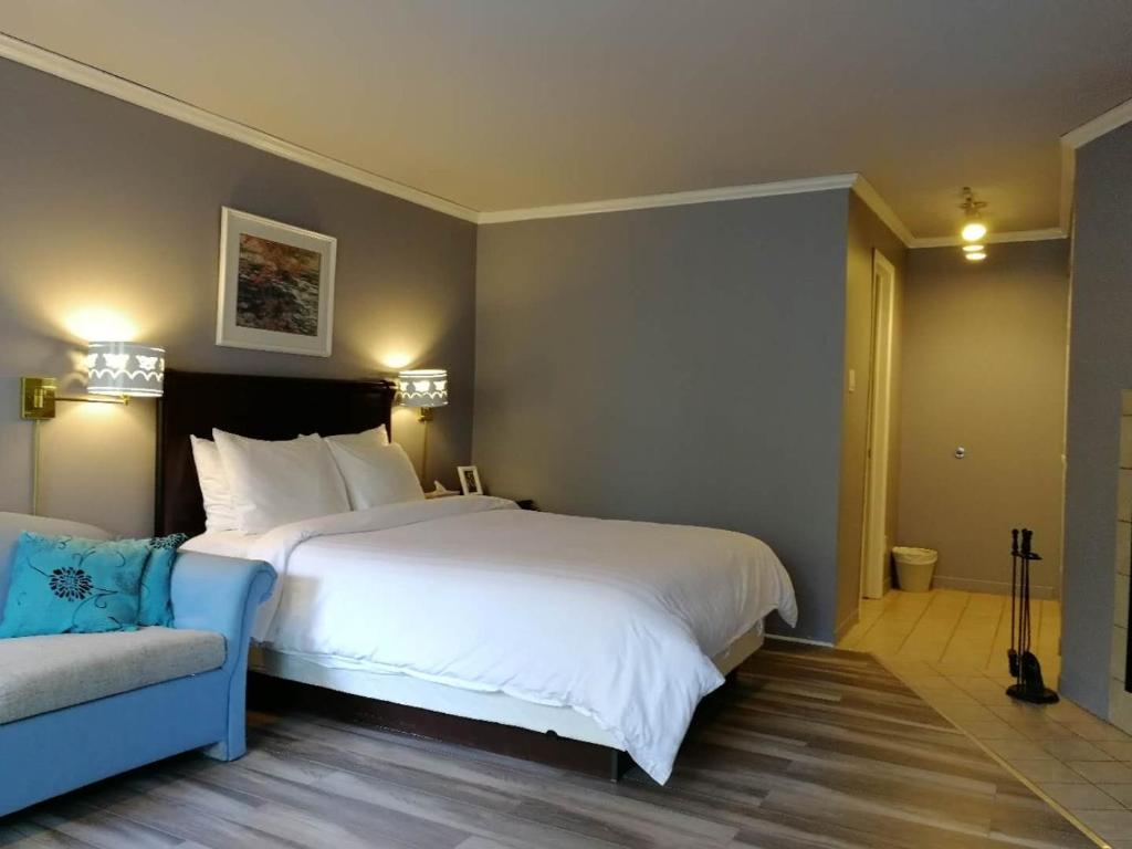 Postel nebo postele na pokoji v ubytování Motel Chantolac