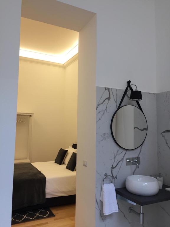 Posteľ alebo postele v izbe v ubytovaní CLUVERIO11 LUXURY APARTMENT