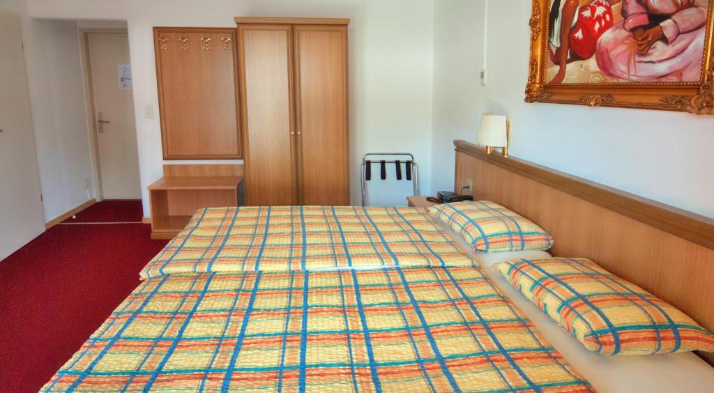 Postel nebo postele na pokoji v ubytování Hotel Dischma - FREE BUS AND TRAIN TICKET
