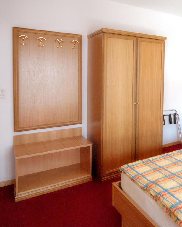 Postel nebo postele na pokoji v ubytování Hotel Dischma - FREE BUS AND TRAIN TICKET