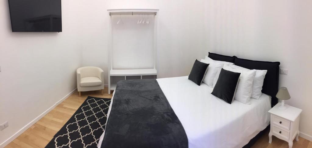 Posteľ alebo postele v izbe v ubytovaní CLUVERIO11 LUXURY APARTMENT