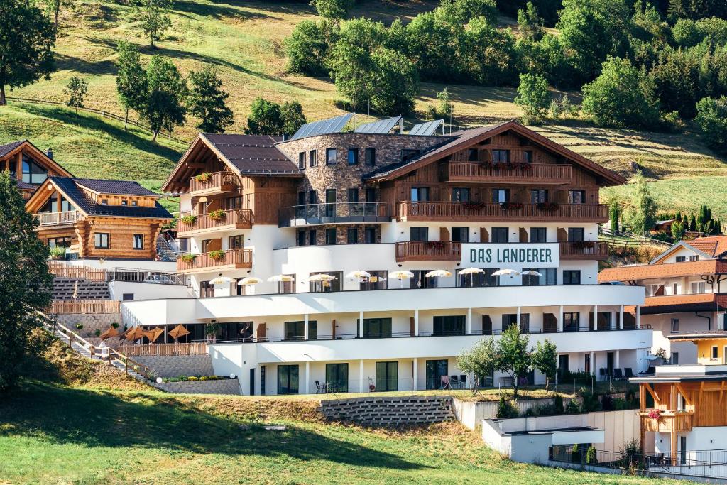 a building with a sign that reads us embassy at Das Landerer in Ladis