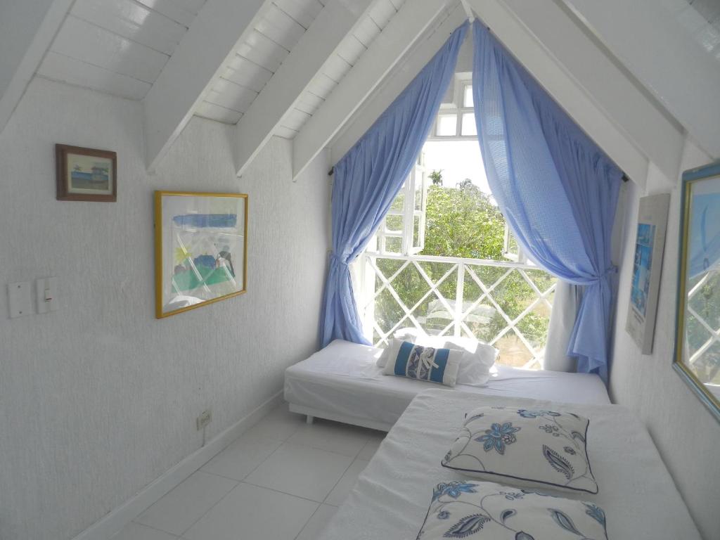 Giường trong phòng chung tại Ocean View Sai