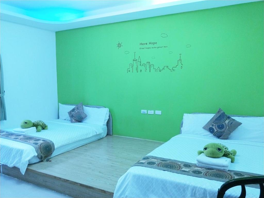 Postel nebo postele na pokoji v ubytování Nandian Homestay