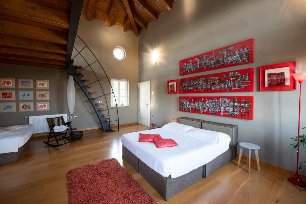 Postel nebo postele na pokoji v ubytování Klinec Plešivo Art Rooms