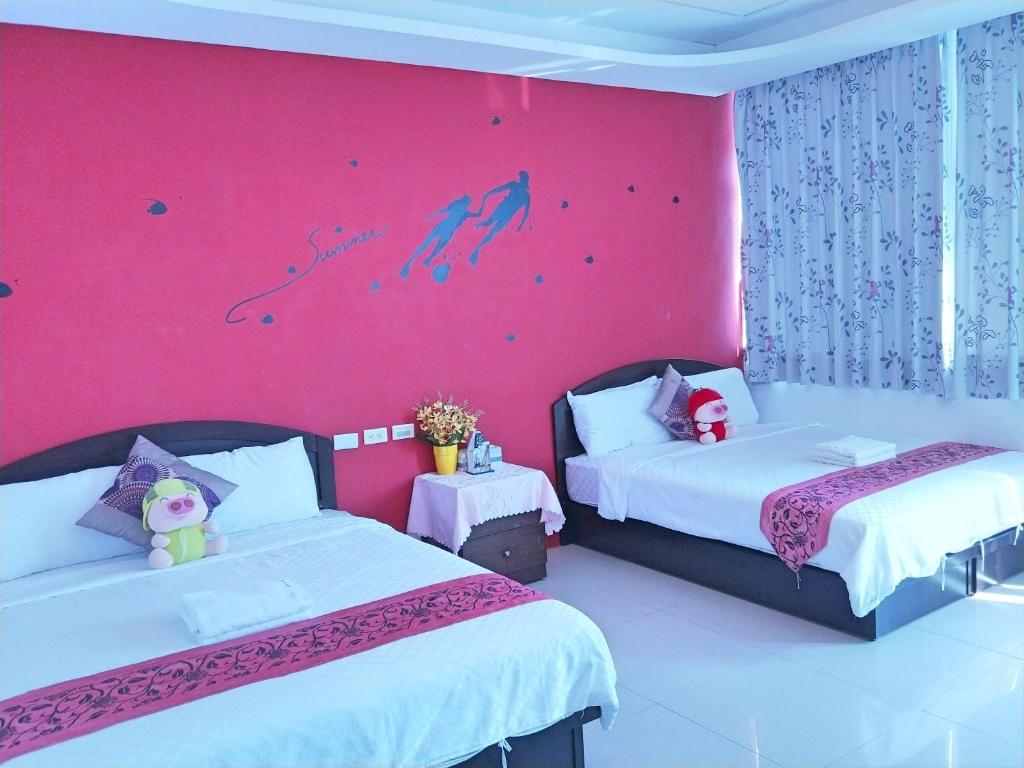 Postel nebo postele na pokoji v ubytování Nandian Homestay