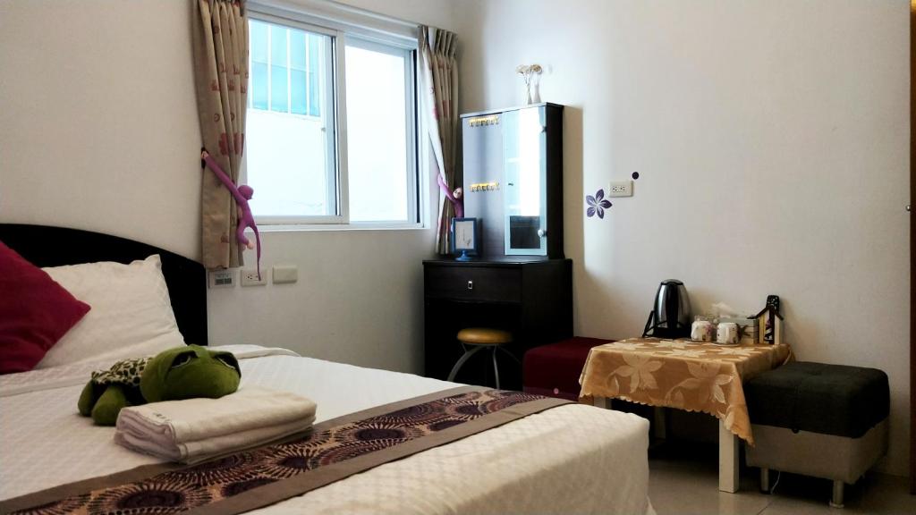 Postel nebo postele na pokoji v ubytování Nandian Homestay