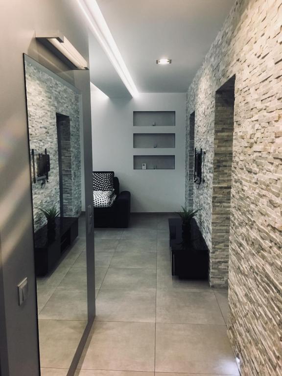 Posteľ alebo postele v izbe v ubytovaní Apartament Ala