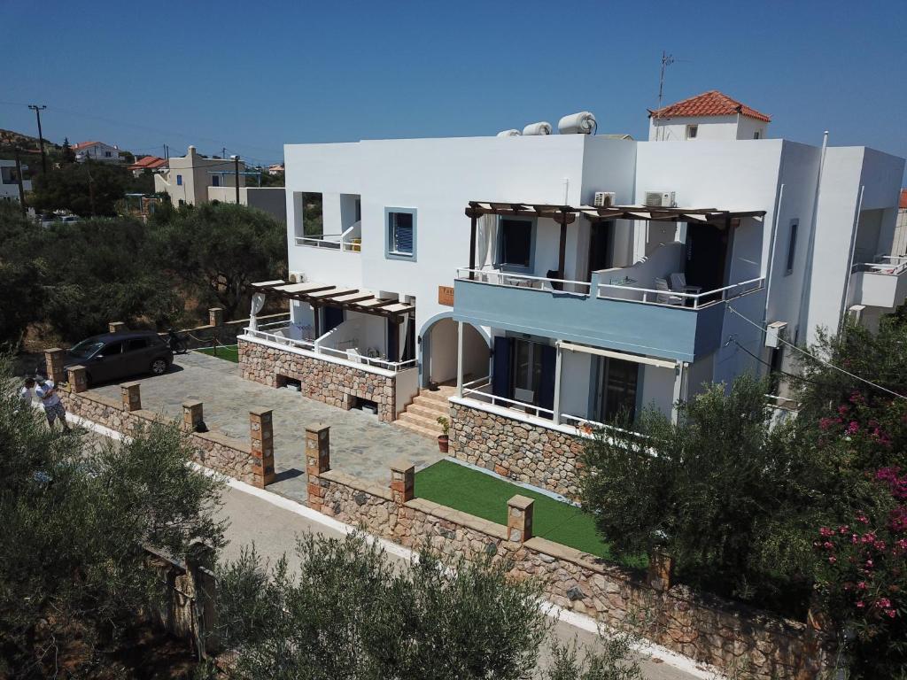 a large white house with a lot of windows at Panorama Elafonisos in Elafonisos