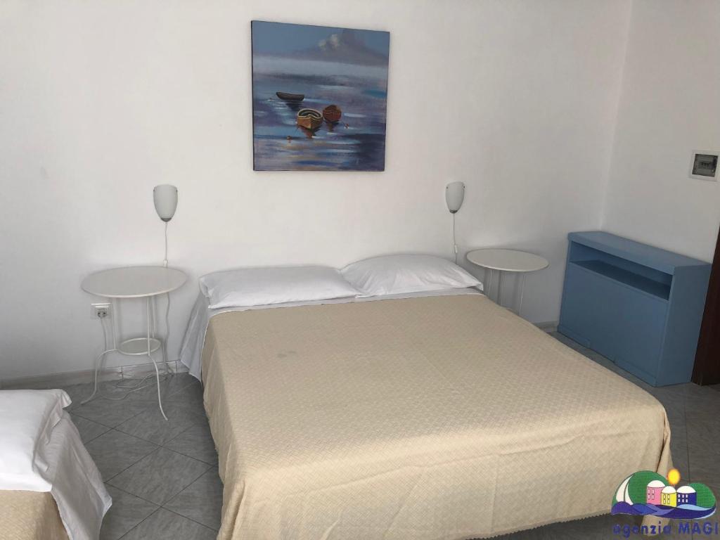 Postel nebo postele na pokoji v ubytování Blu Mare